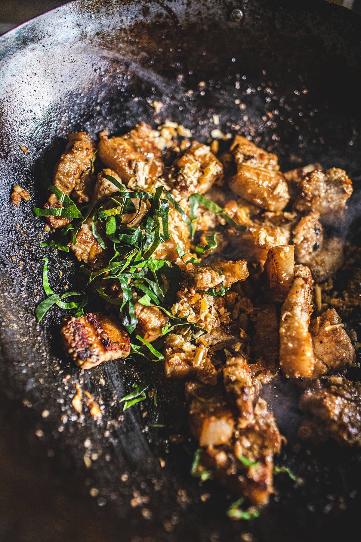 Prik king pork belly stir fry with kaffir lime leaves.