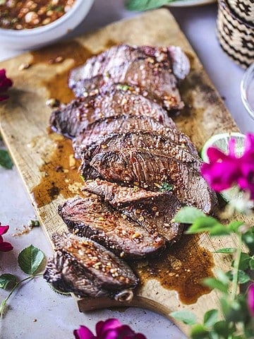 sliced beef on cutting board