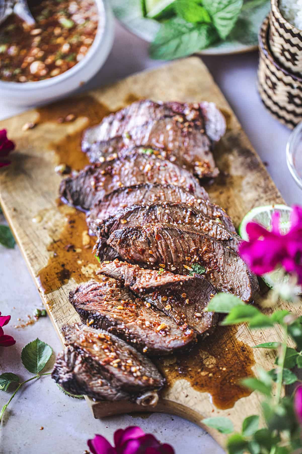 sliced beef on a cutting board