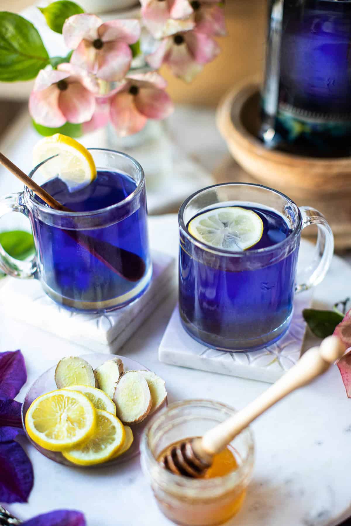 butterfly hot tea in a cup with lemon slice.