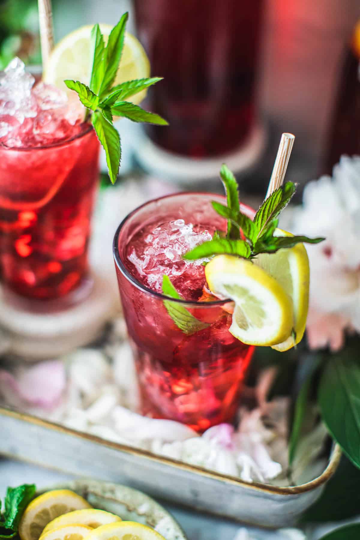 hibiscus tea in a glass on a tray