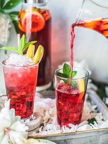 pouring hibiscus tea