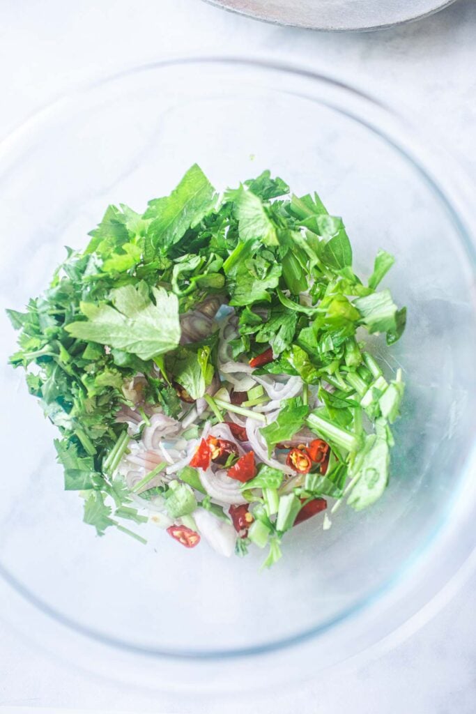 salad in a clear glass bowl