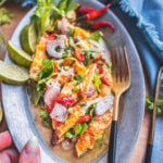 Hand holding Egg salad in a platter