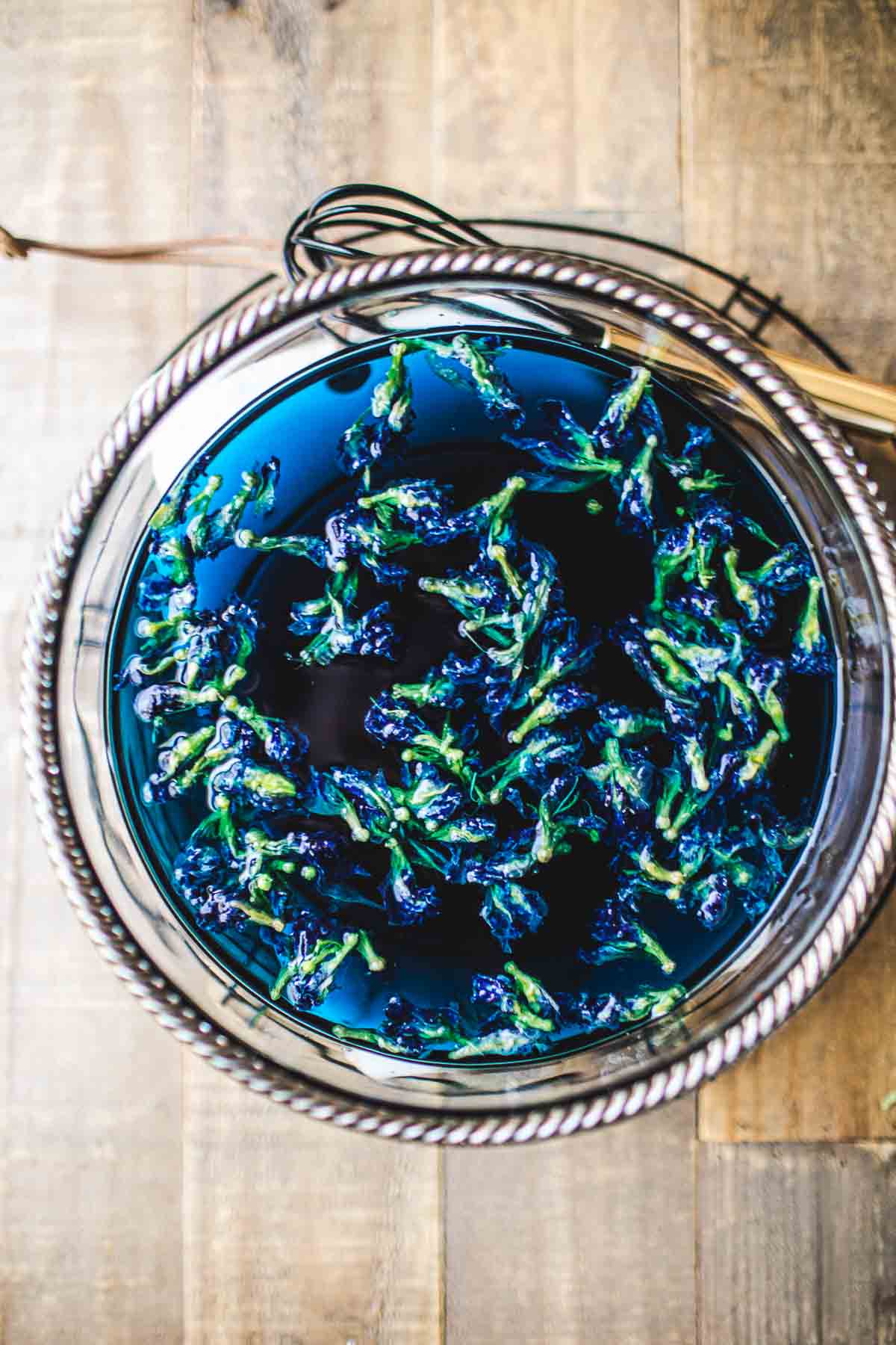 butterfly pea flowers in a glass bowl