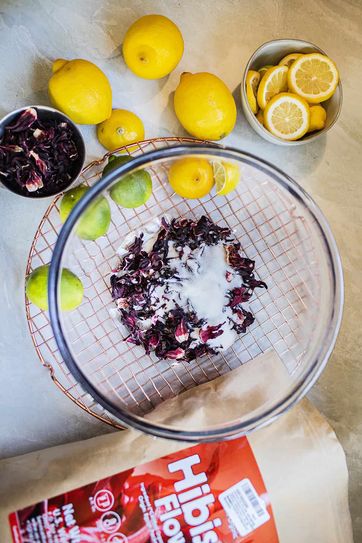 ingredients for hibiscus tea in a bowl. 