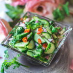 cucumber salad in a glass bowl