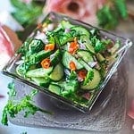 cucumber salad in a glass bowl