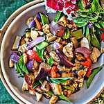 eggplant stir fry in a round plate.