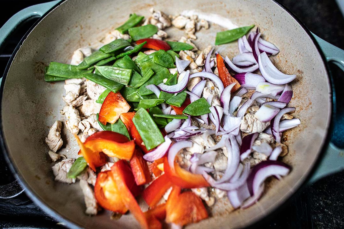 sautéed bell pepper, onion and pea pods