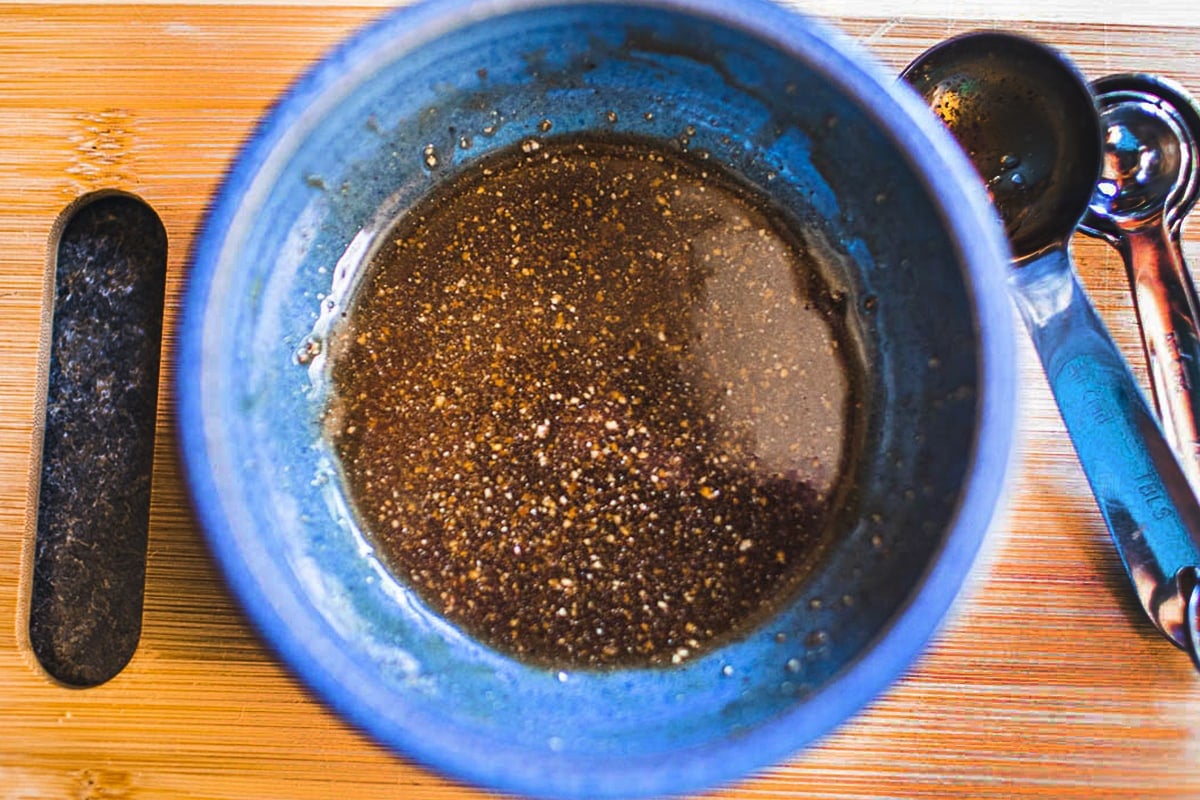 Stir fry sauce in a blue bowl