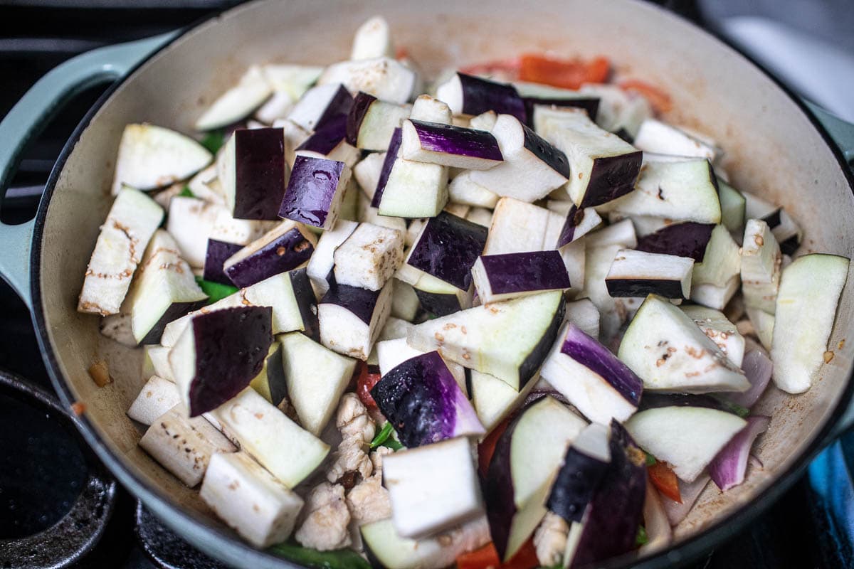 eggplant stir frying in a pan