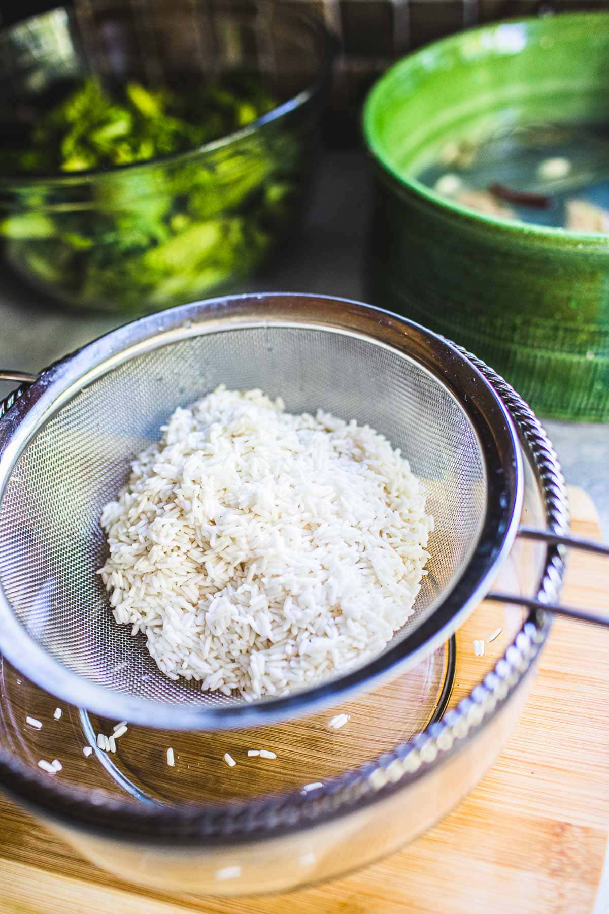 drained sticky rice in a strainer