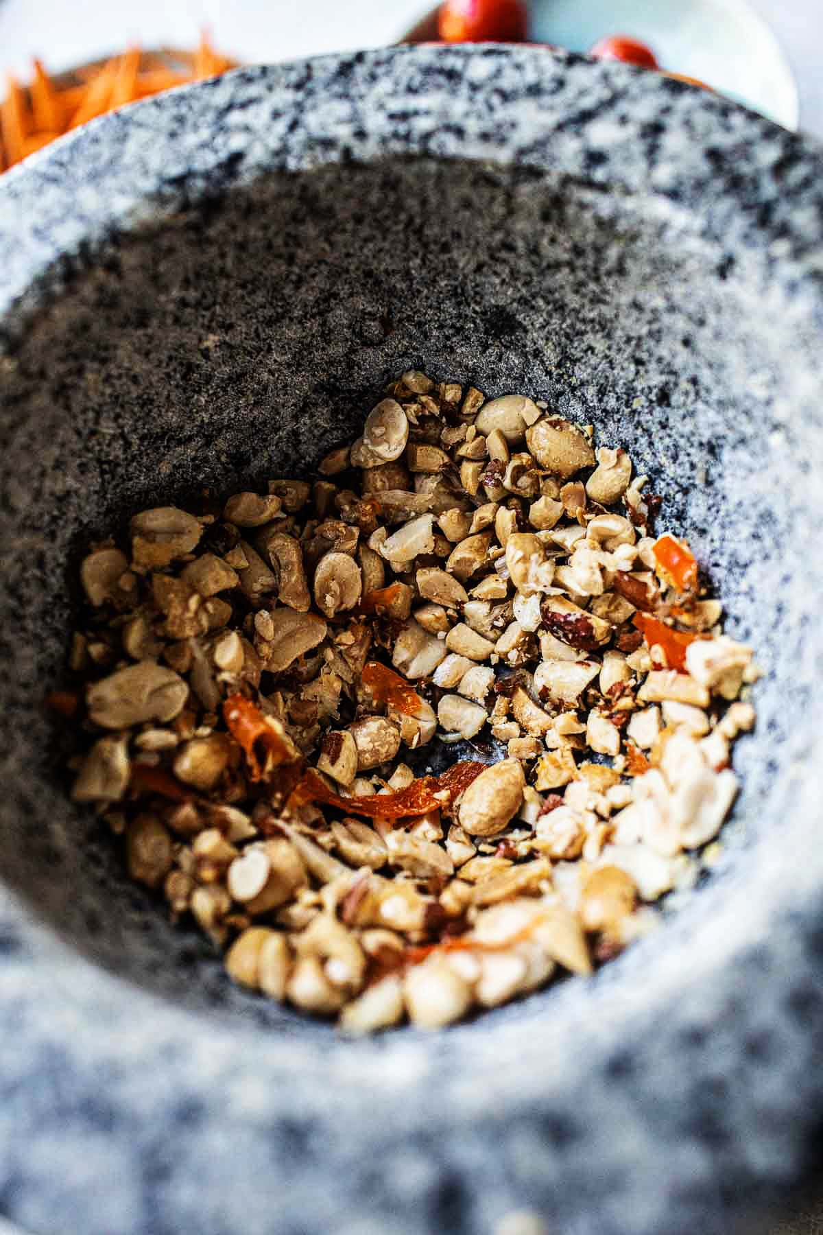 garlic, chili and peanuts crushed in a mortar