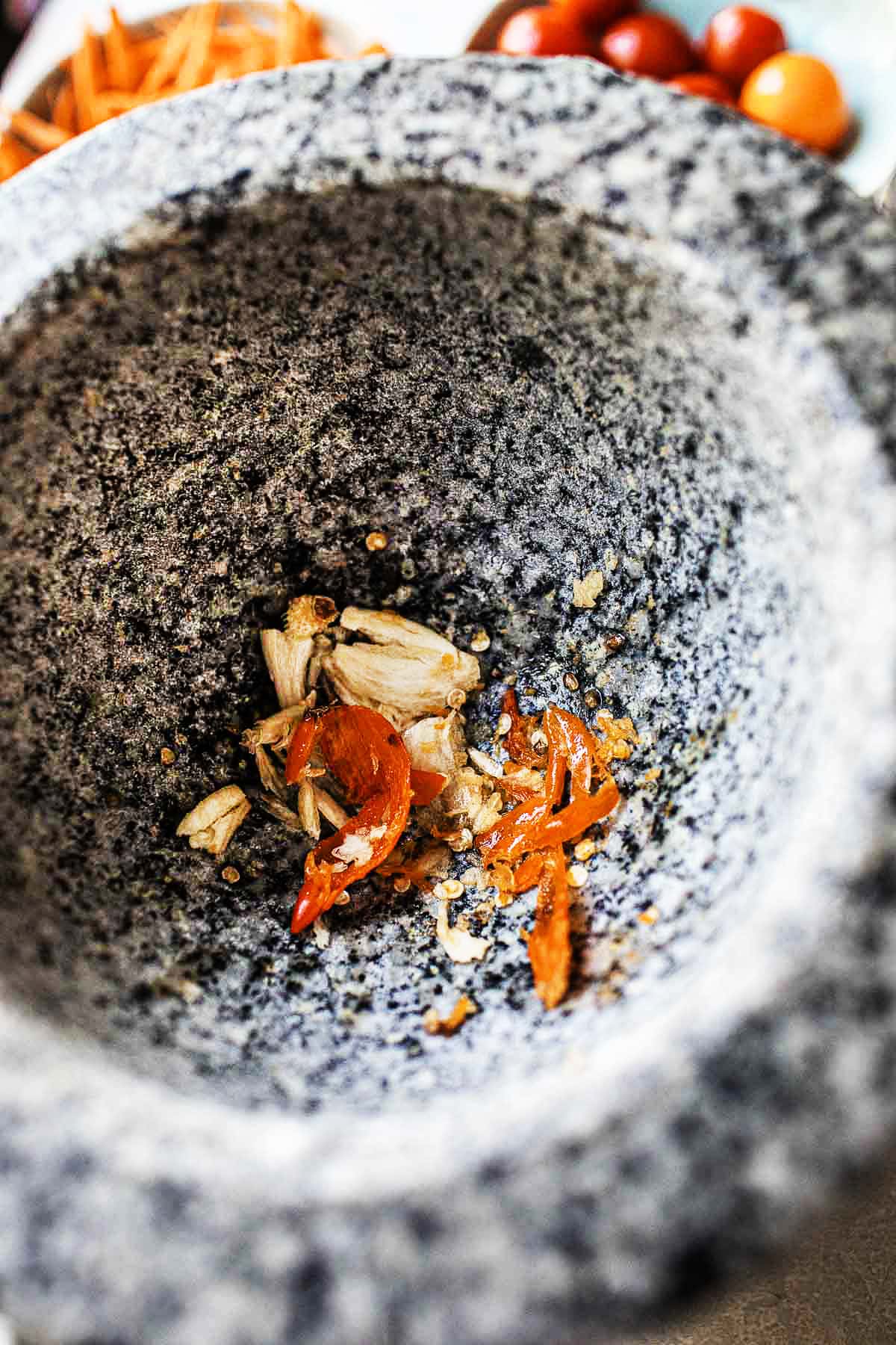 garlic and chili in a mortar