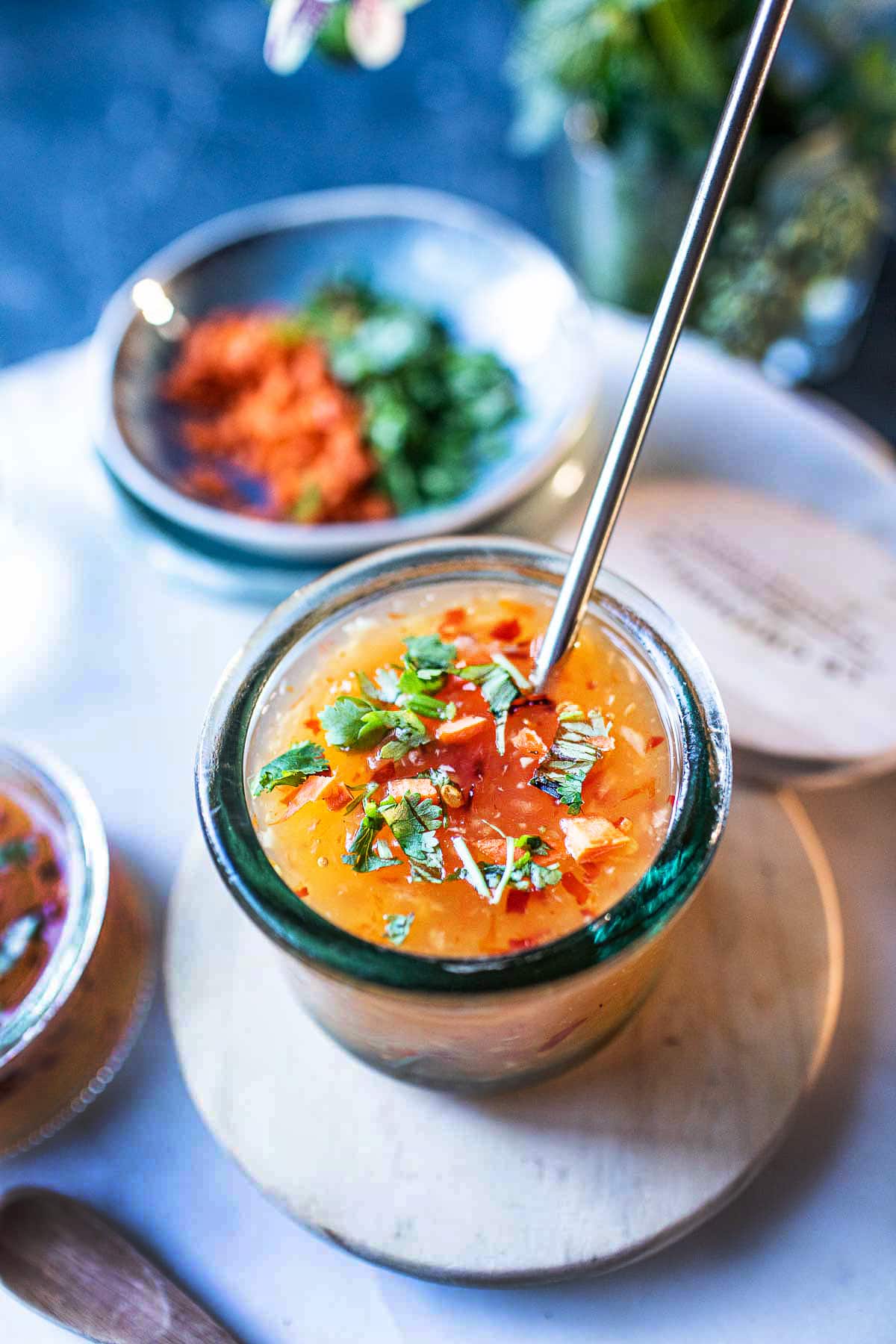 thai spicy dipping sauce with a spoon dipped in