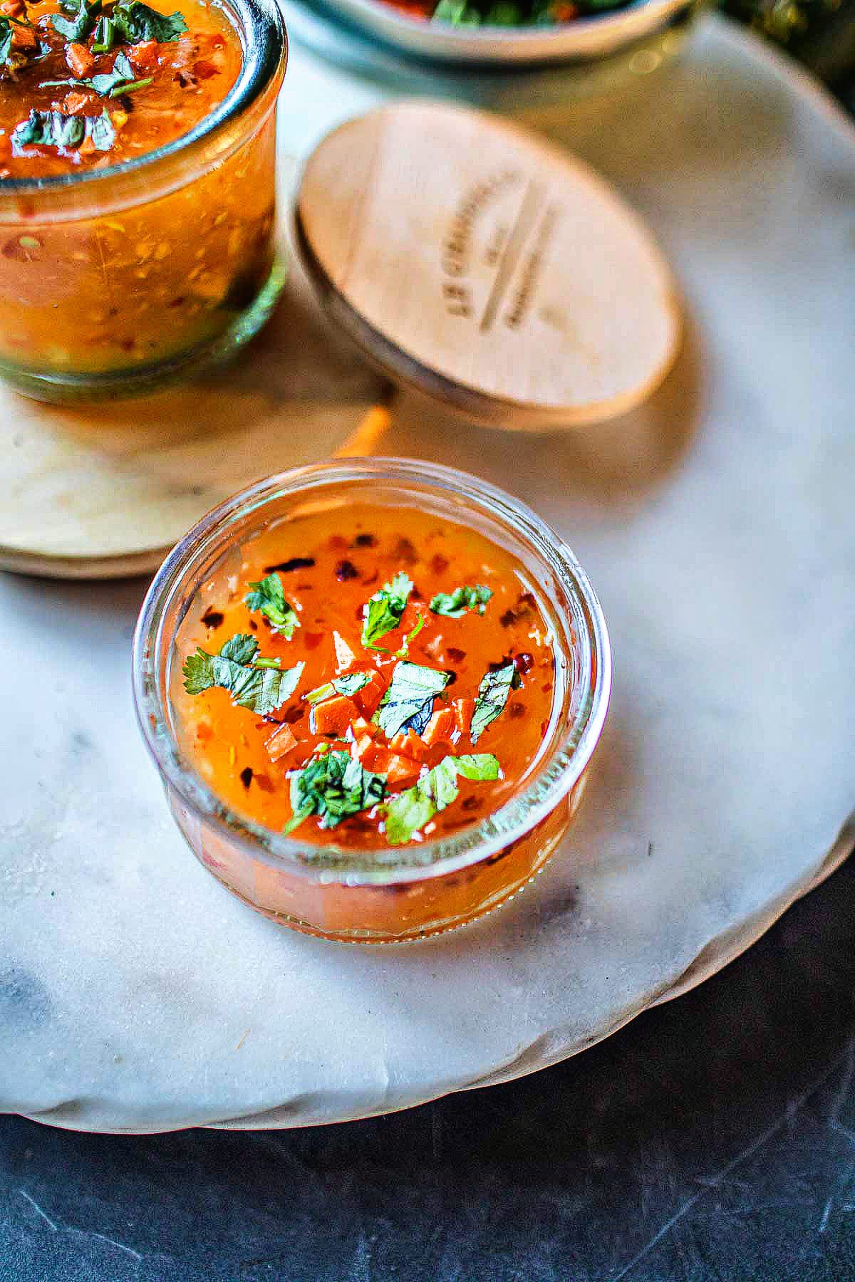 homemade Thai sweet chili dipping sauce in a glass bowl