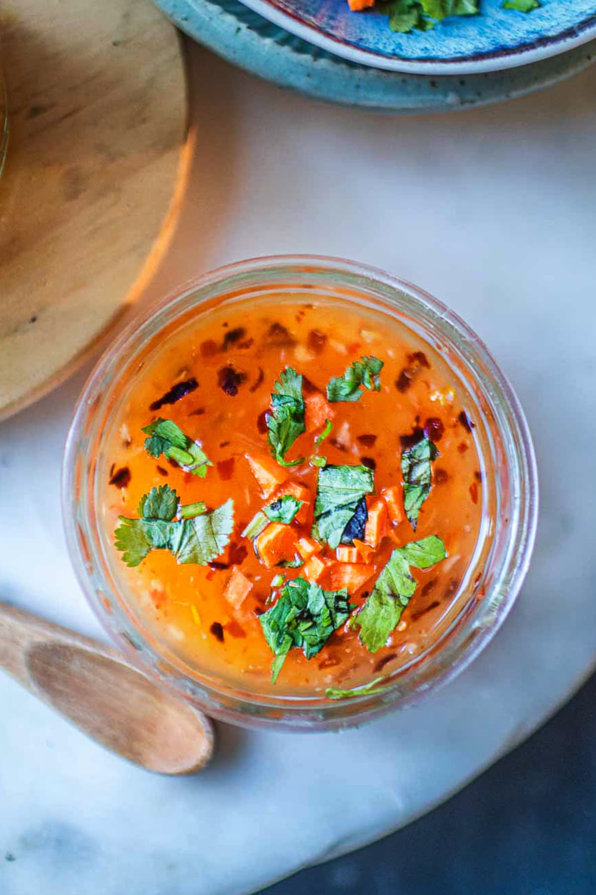 thai spicy dipping sauce in a glass jar on the table