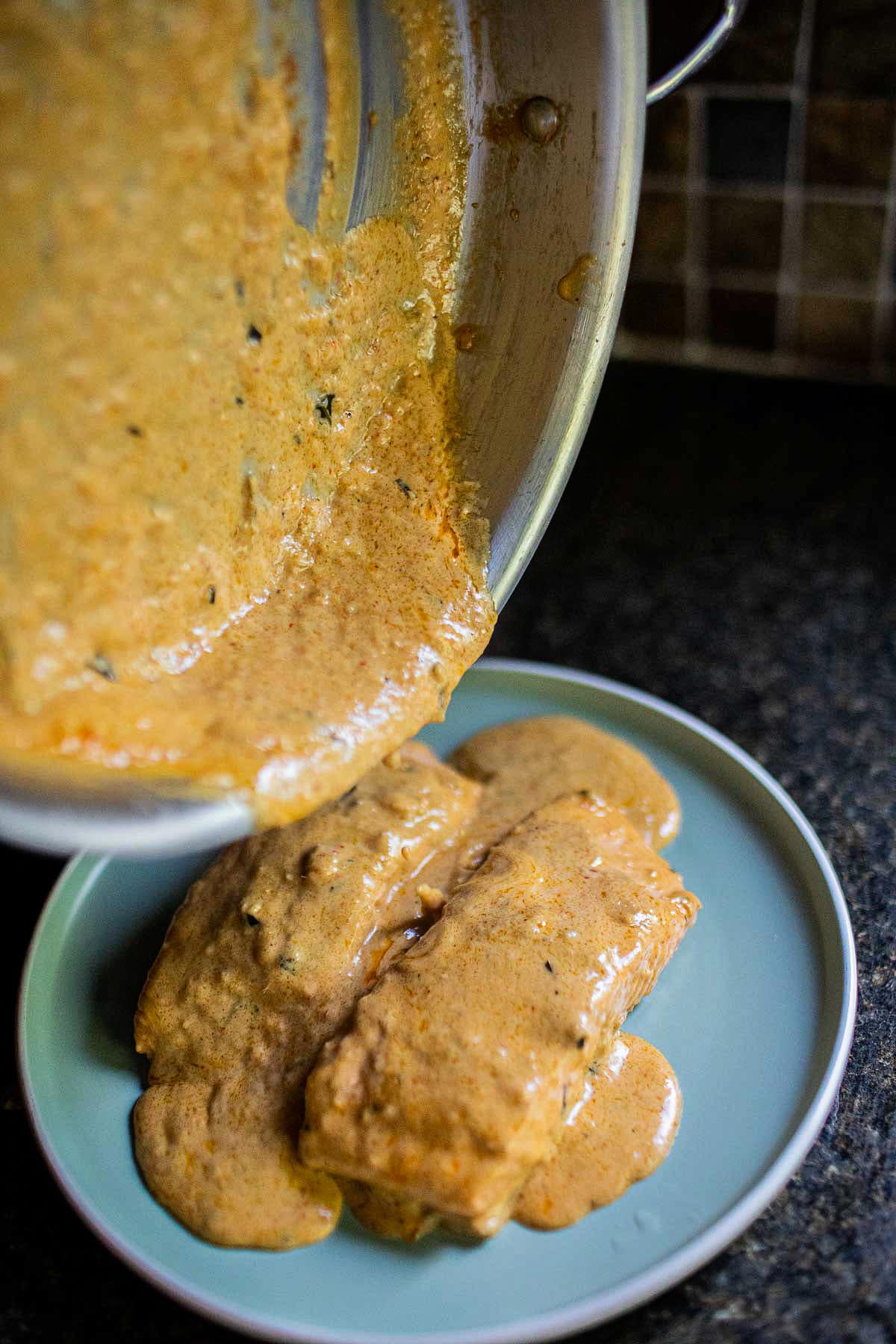 choo chee curried sauce over salmon fillets