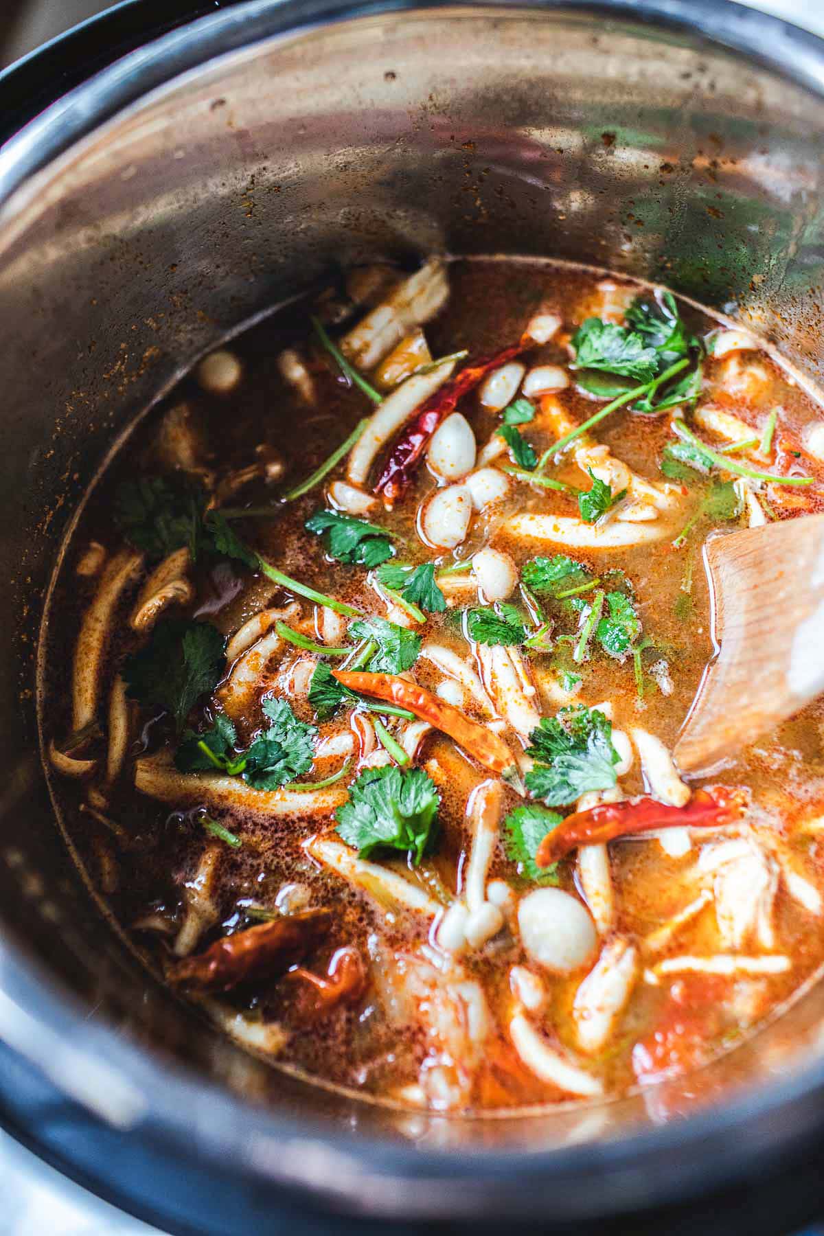 vegetables and herbs in tom yum broth in instant pot 