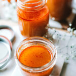 tom yum broth in glass jars