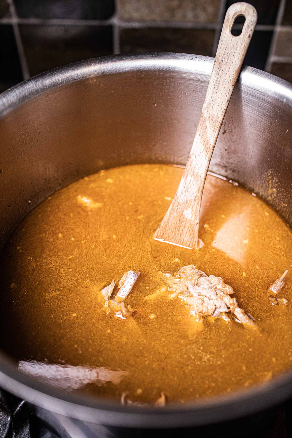 tom yom bone broth in a pot