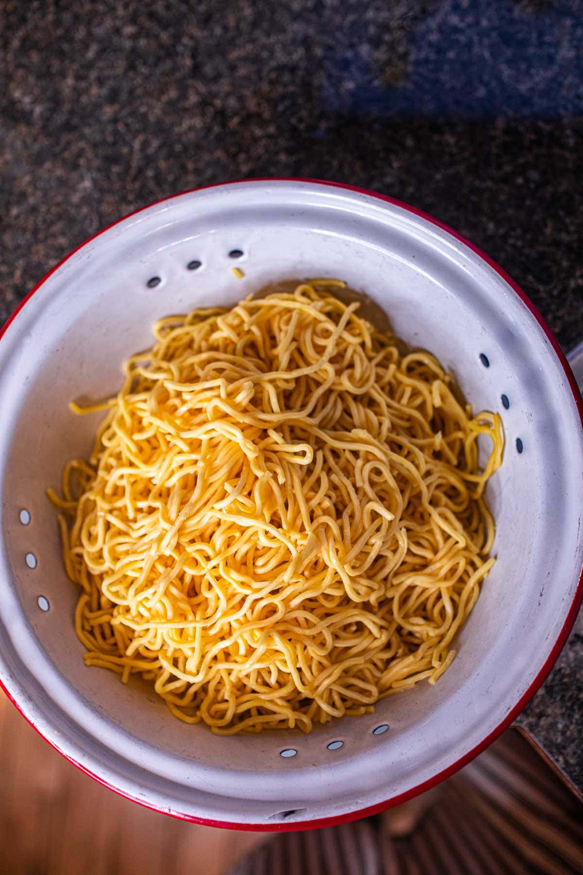 yakisoba noodles for stir fry in a colander