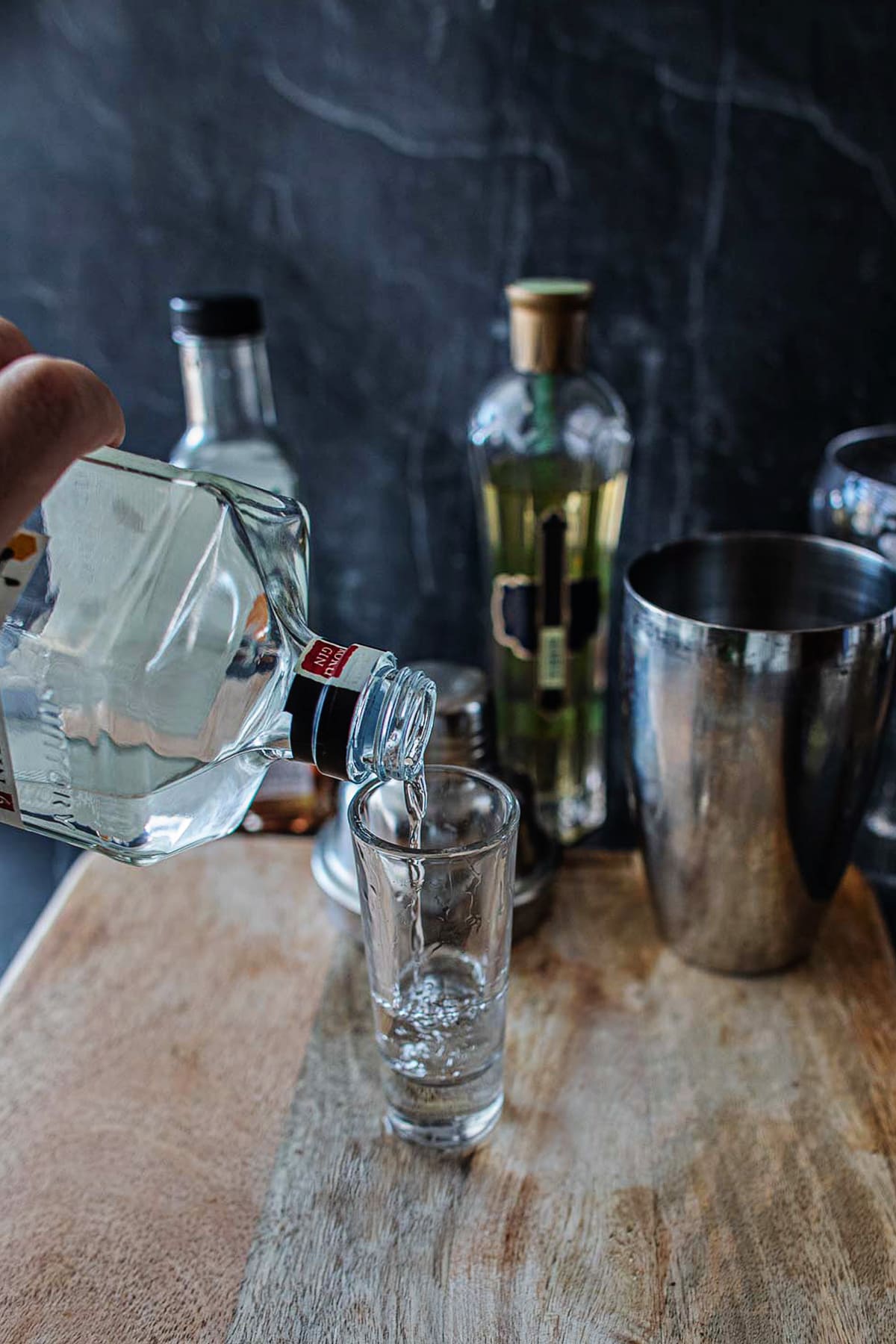 roku gin pouring into a shot glass