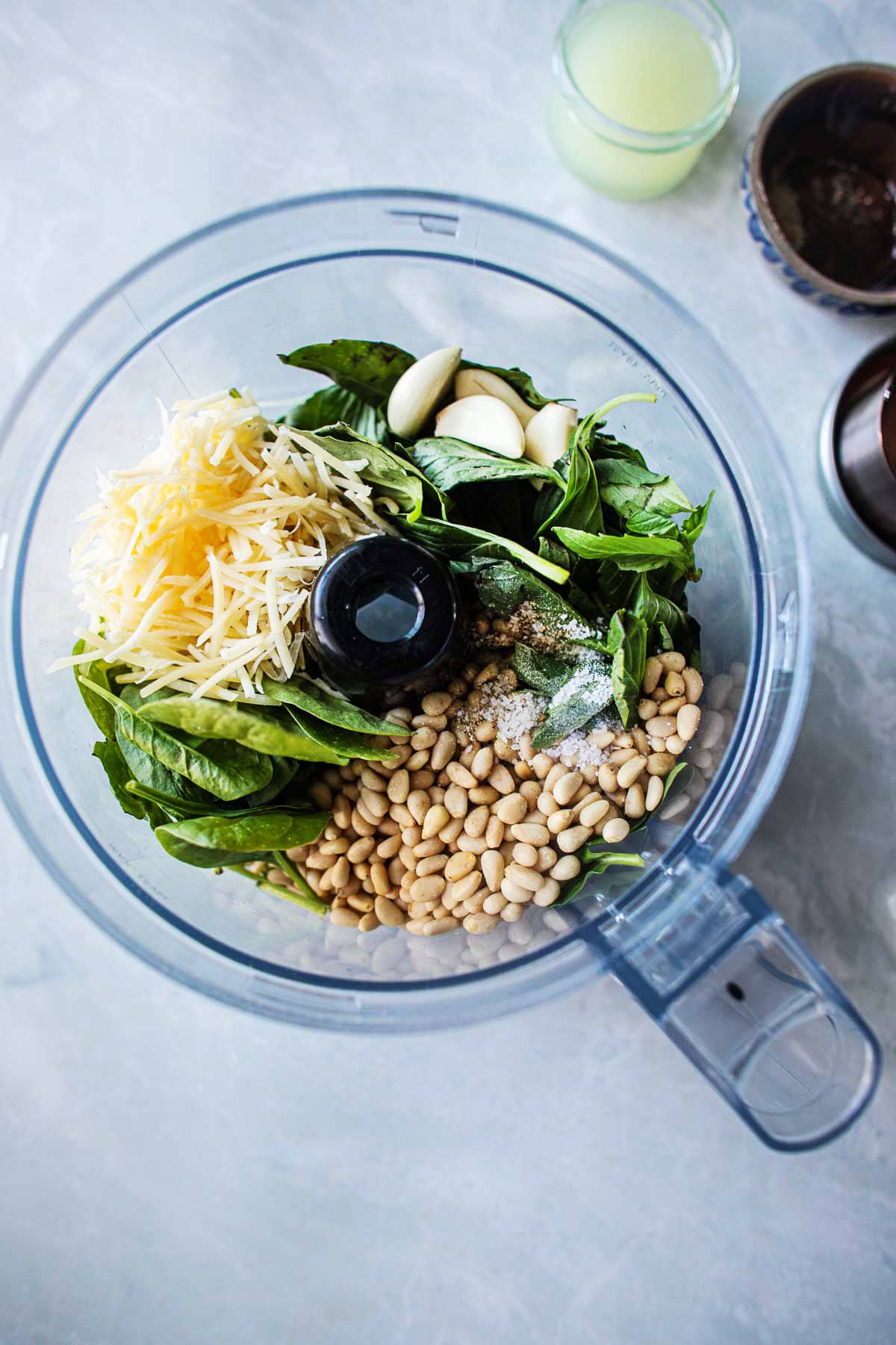 thai basil pesto ingredients in a food processor