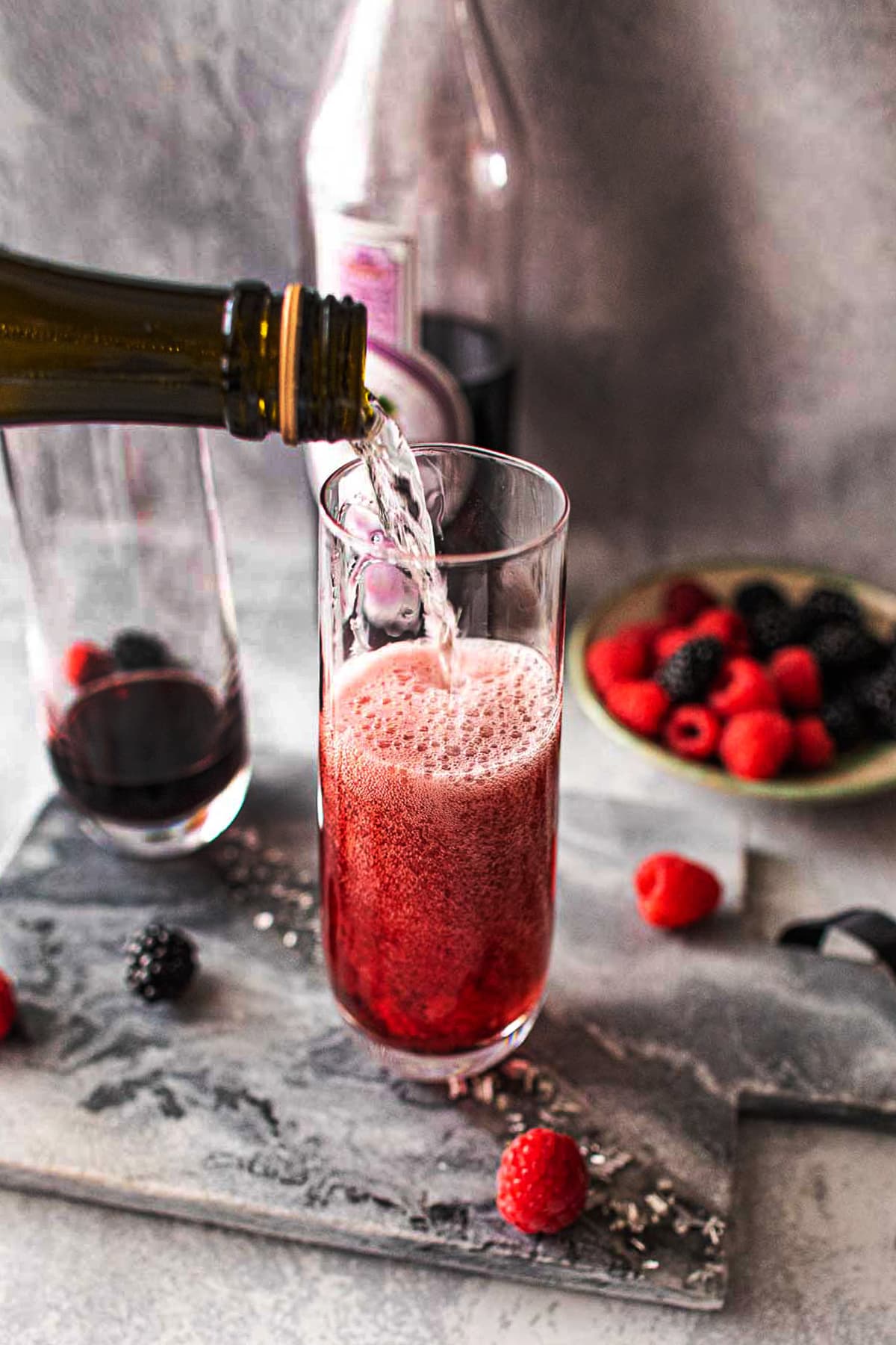 Kir royale champagne cocktail in champagne flutes