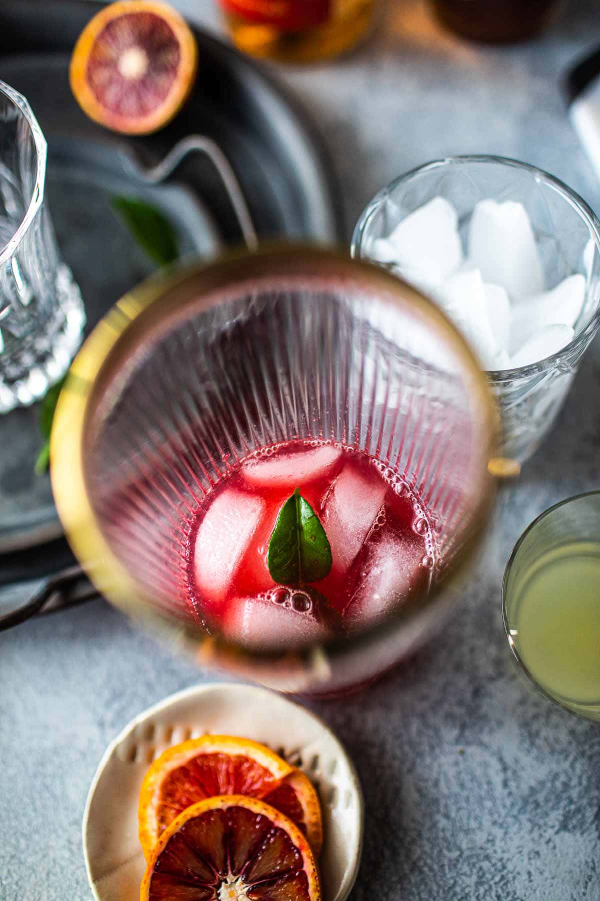 Tanqueray Sevilla orange cocktail in a shaker.
