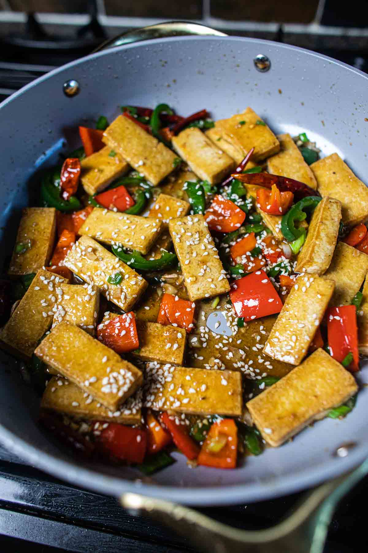 Thai black pepper and garlic tofu in pan. 