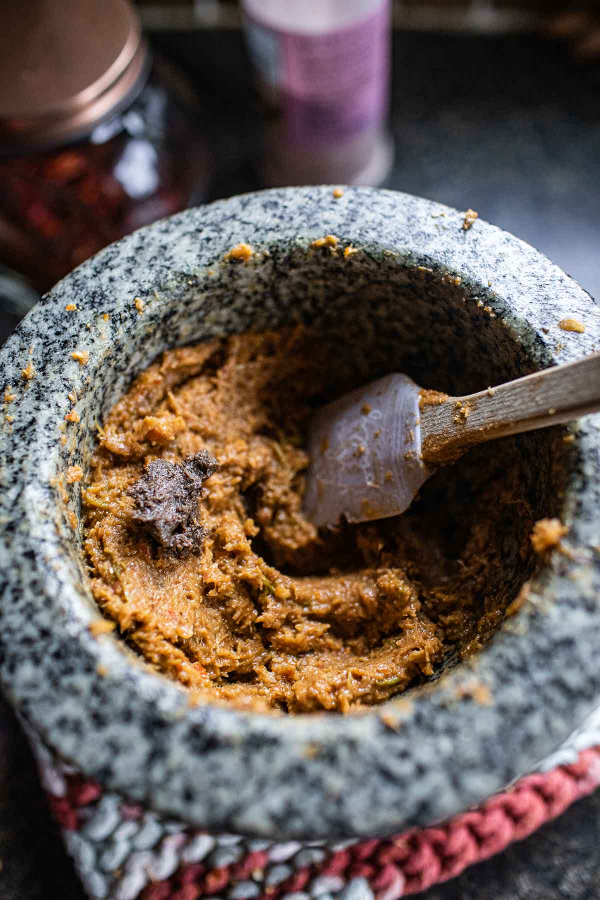 shrimp paste in a mortar with tom yum paste. 