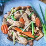 Thai ginger chicken stir fry on a plate.