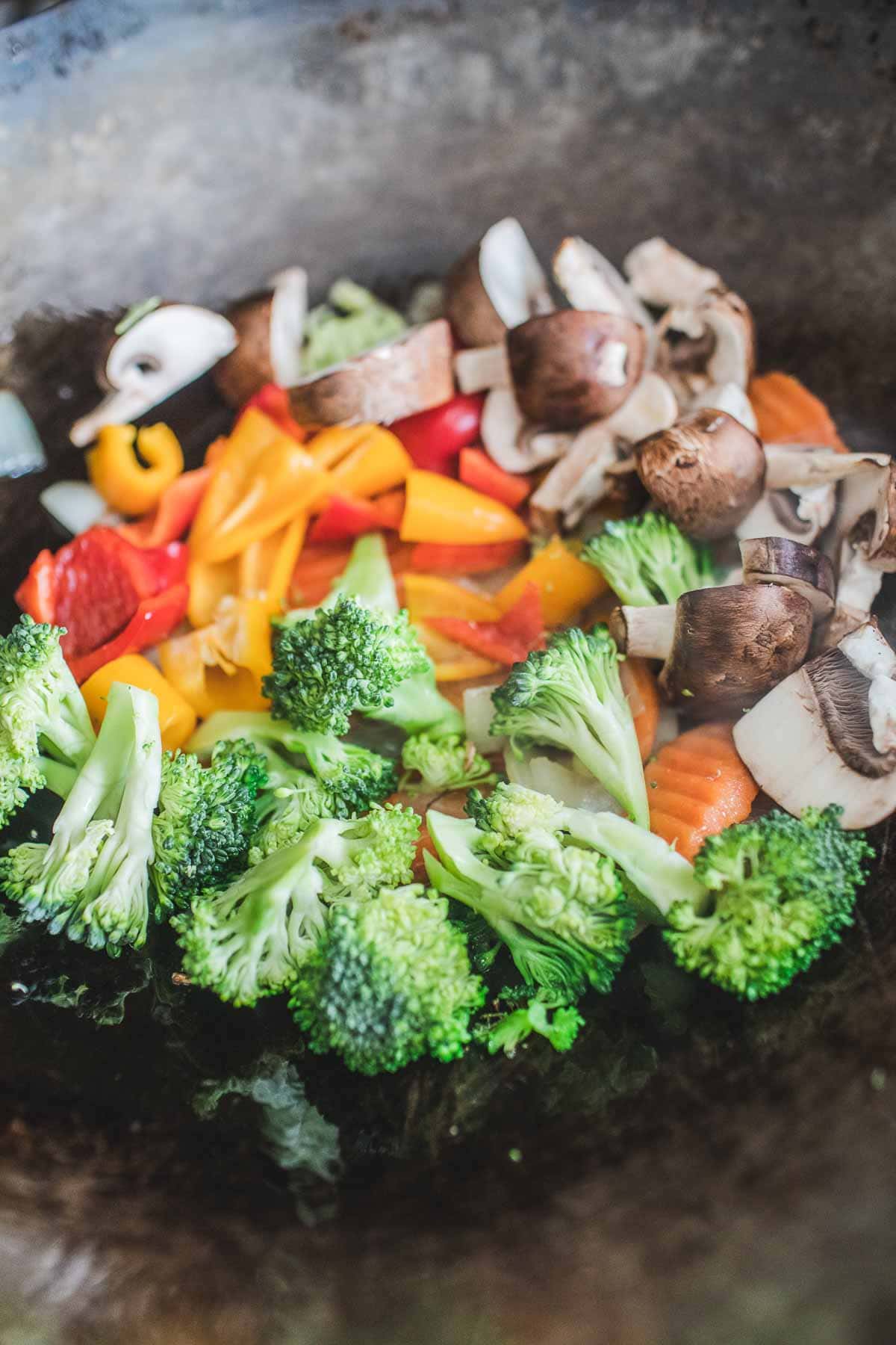 Vegetables pieces in a wok for making Thai Pad Pad Room Mit.