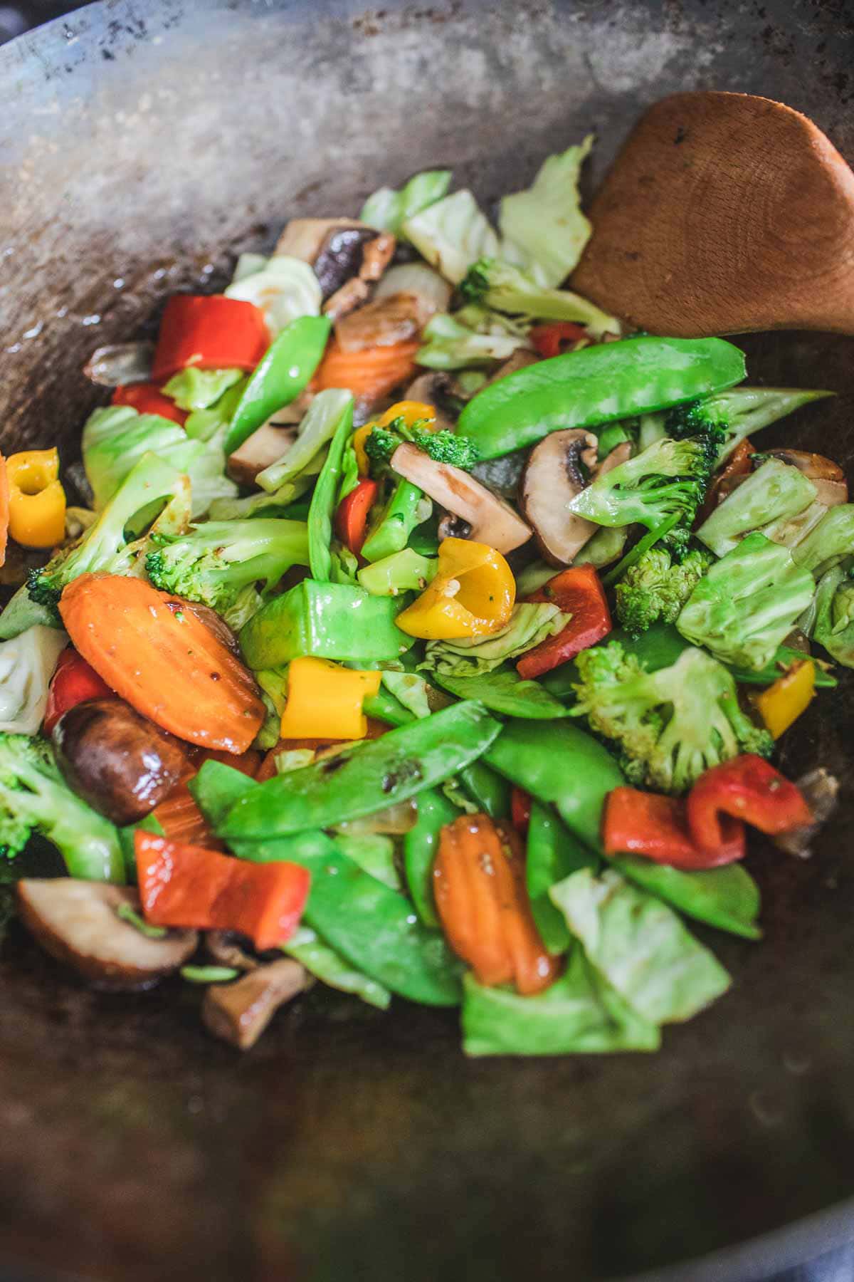 Vegetables pieces in a wok for making Thai mixed vegetable stir fry.