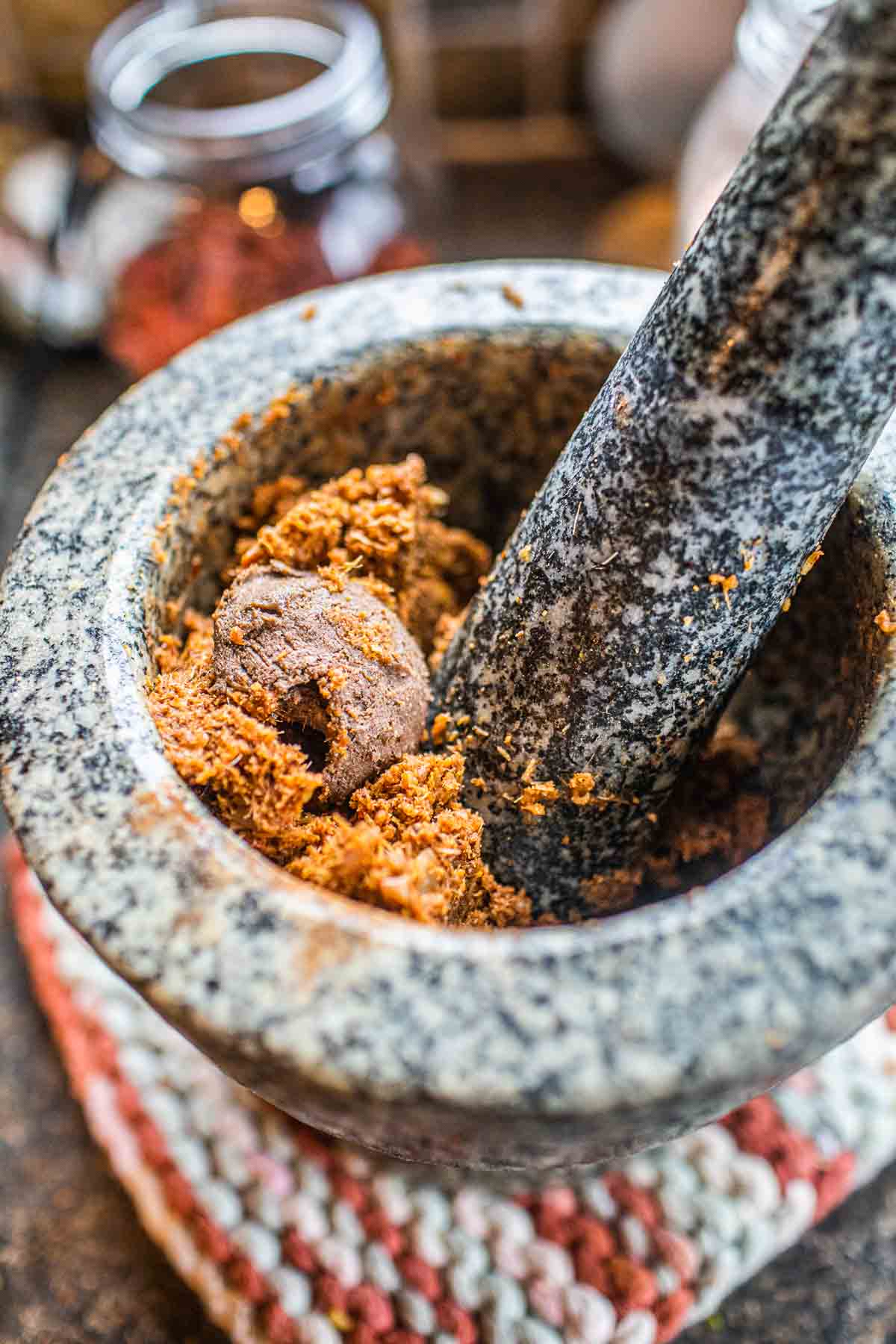 Shrimp paste in a mortar and pestle. 