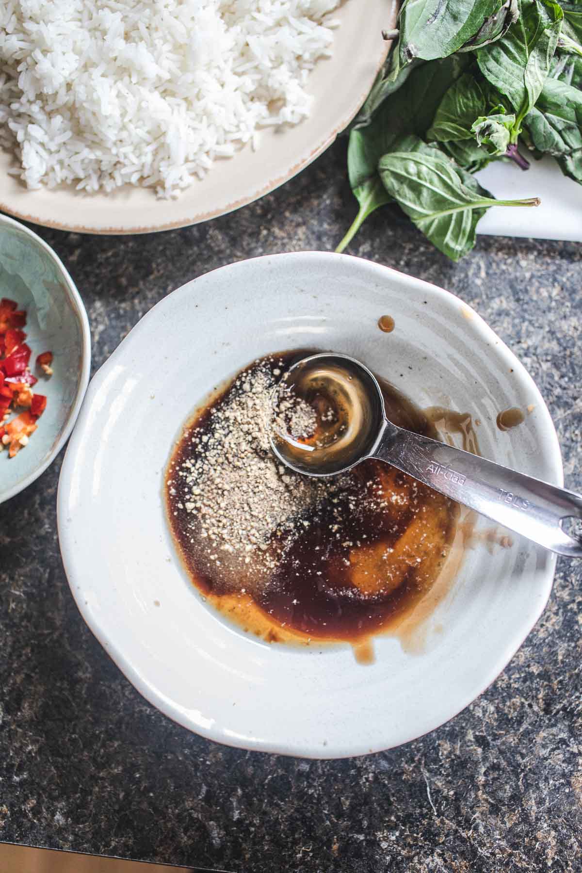 Sauce in a small bowl for basil fried rice.