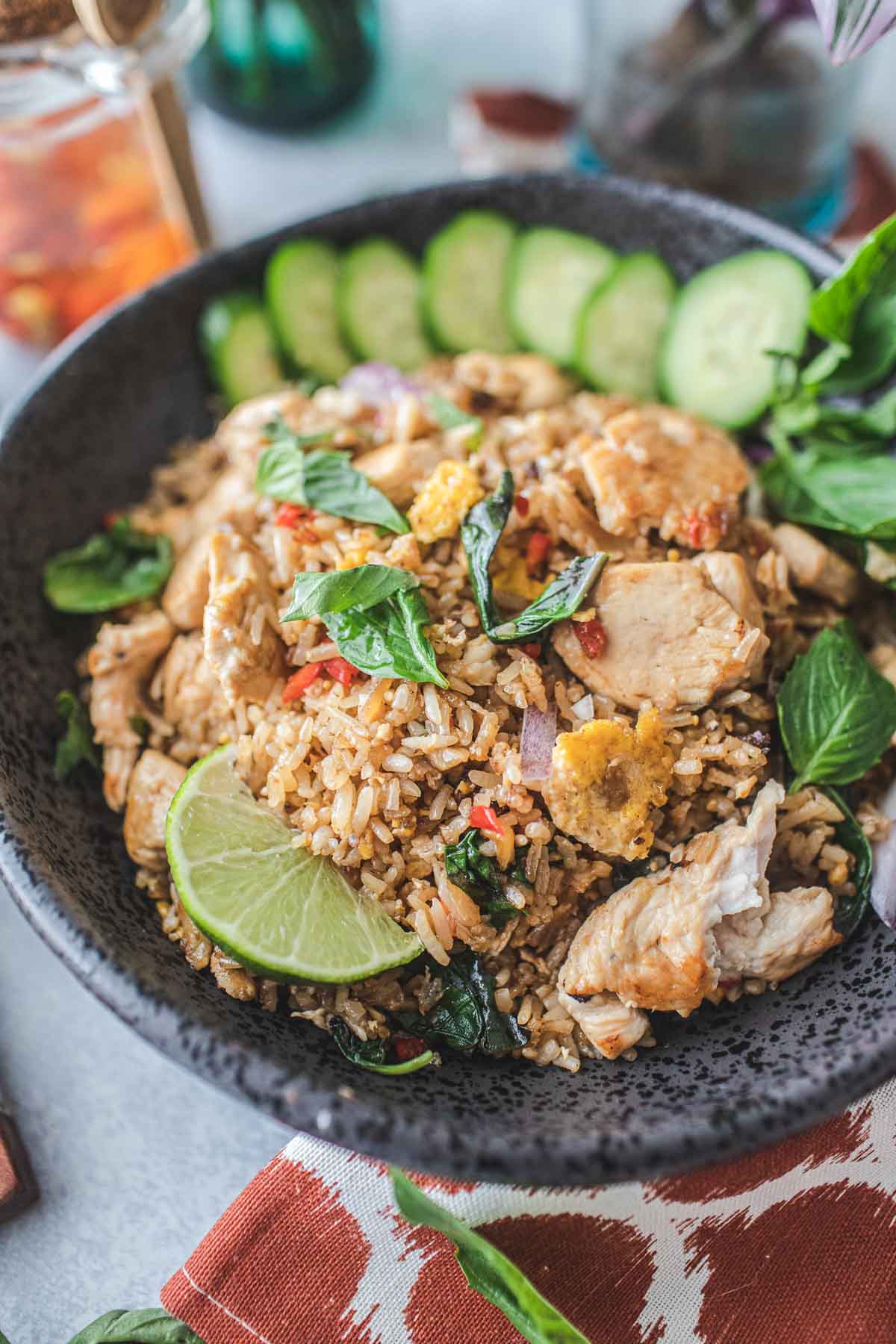 Spicy thai chicken basil fried rice on a plate.