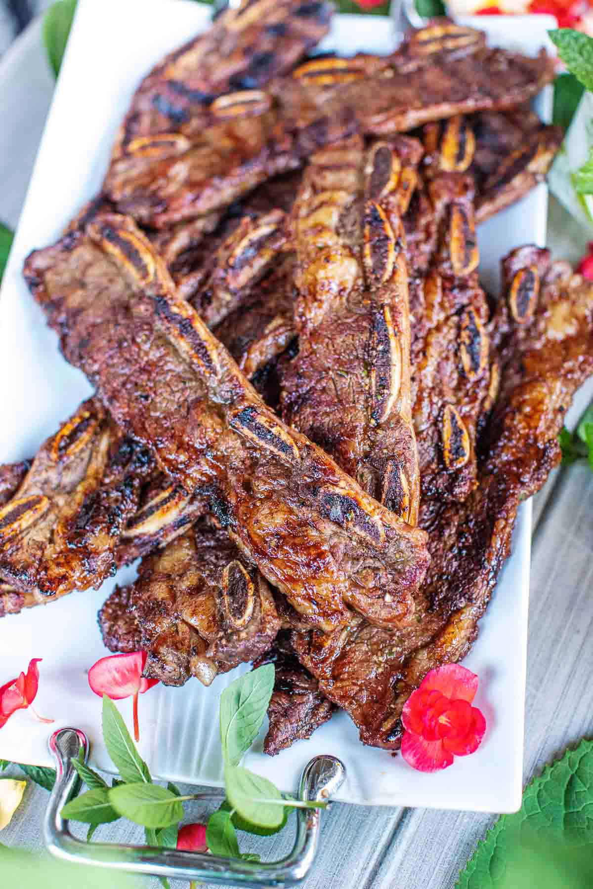 grilled Beef ribs on a platter.