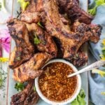 Grilled pork ribs on a platter.