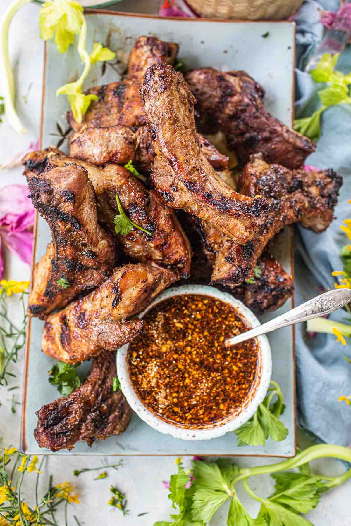 Grilled pork ribs on a platter.