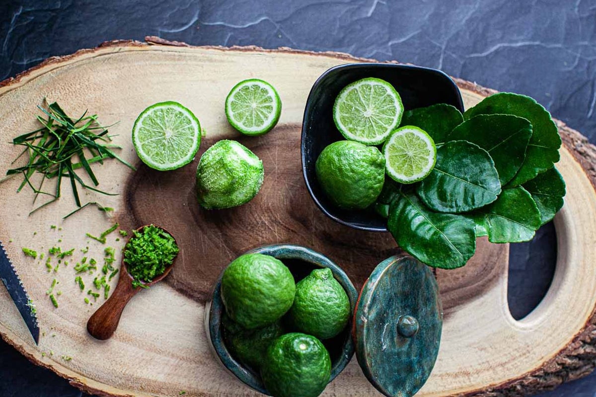 Kaffir limes on a cutting board.