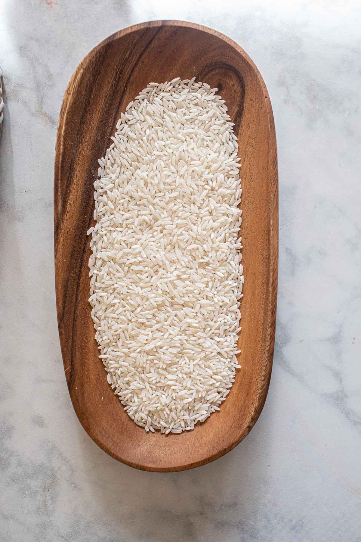 White rice in a wooden bowl. 