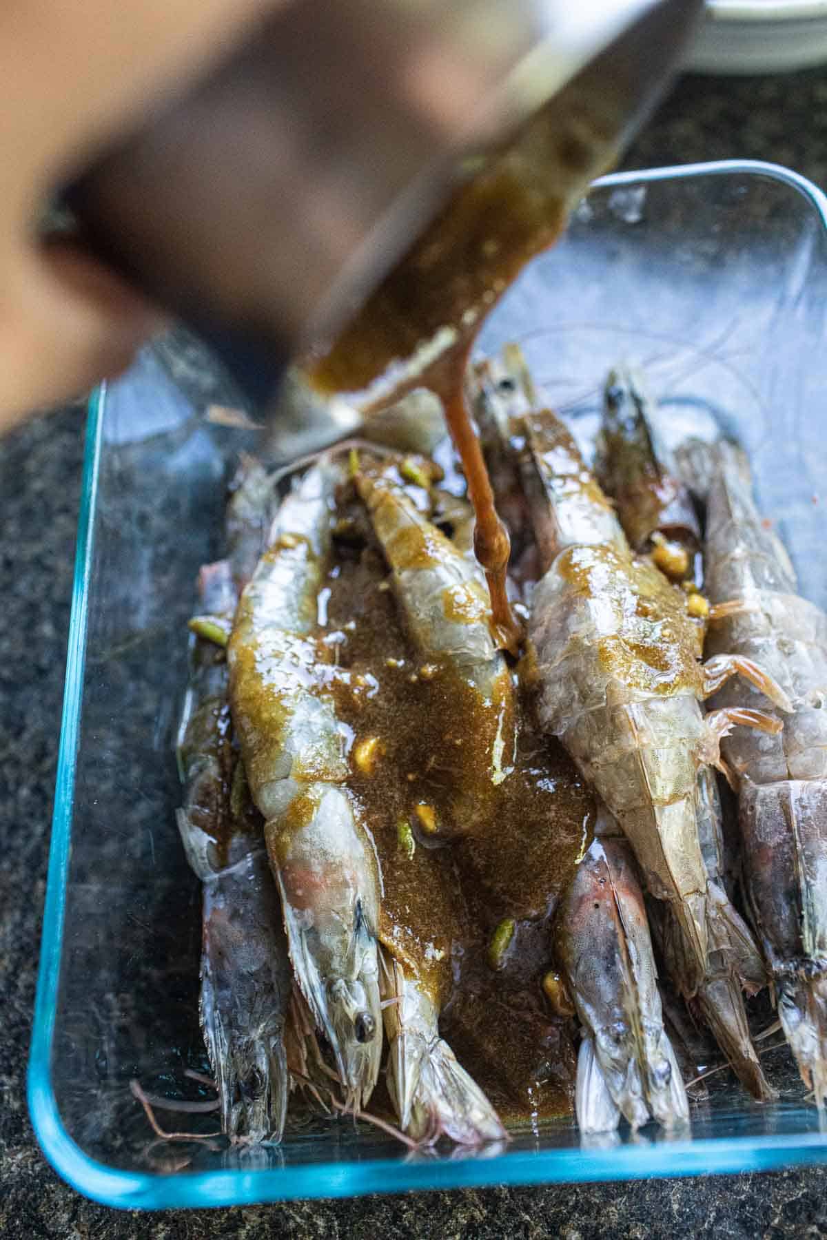 large prawns in a glass container. 