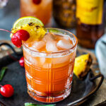 Mekhong whiskey sour cocktail on a tray.