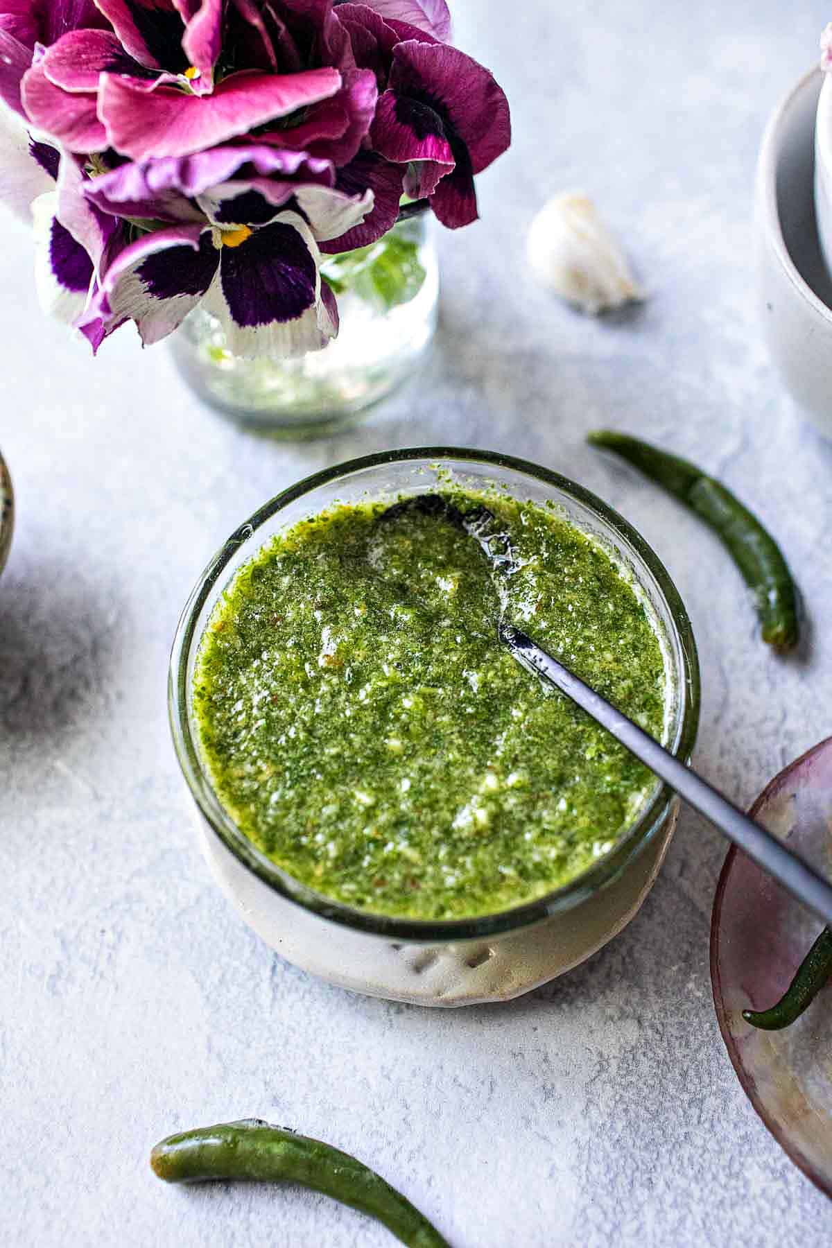 Green seafood sauce in a glass bowl.