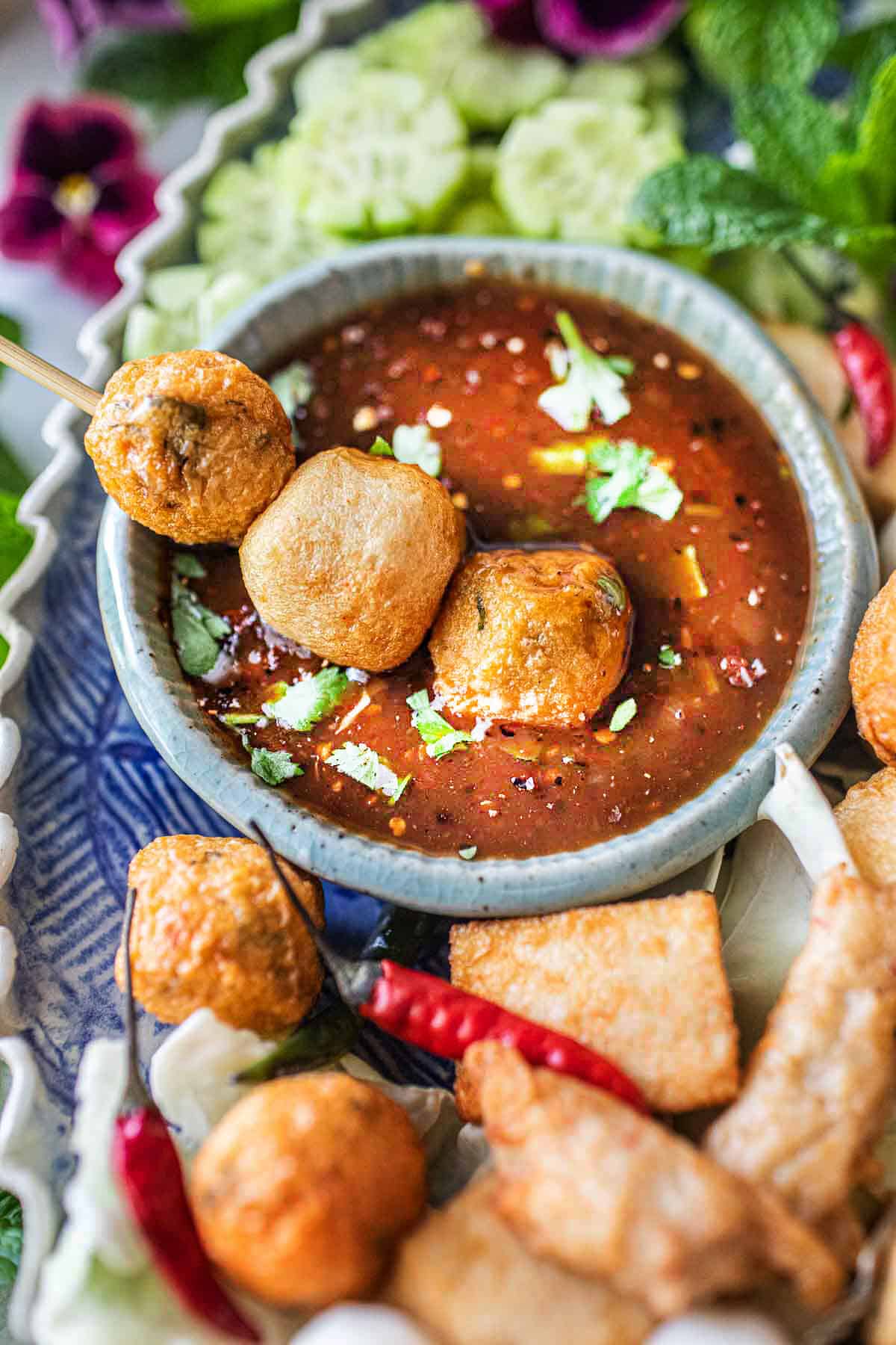 meatballs dipped in tamarind sauce.