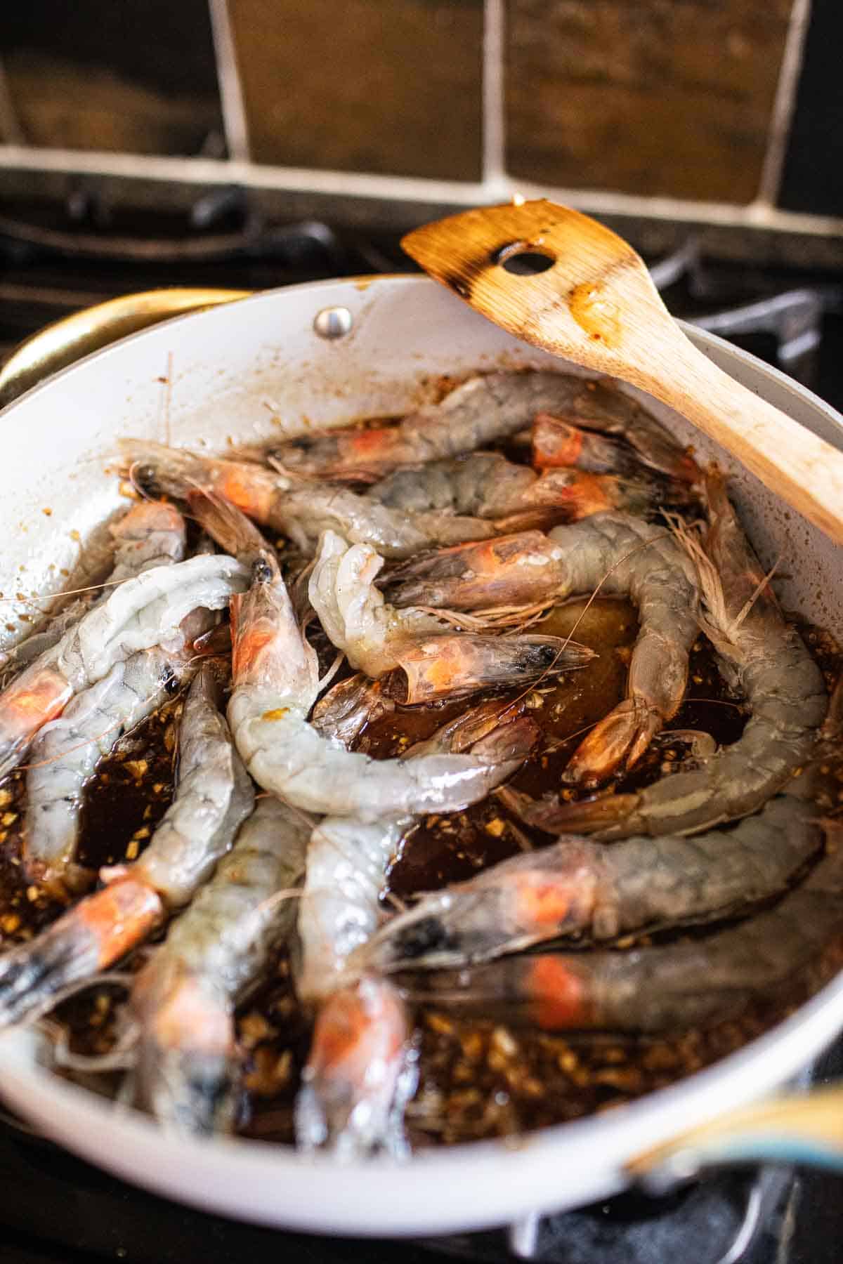 Tiger prawns tamarind in tamarind sauce in a pan. 