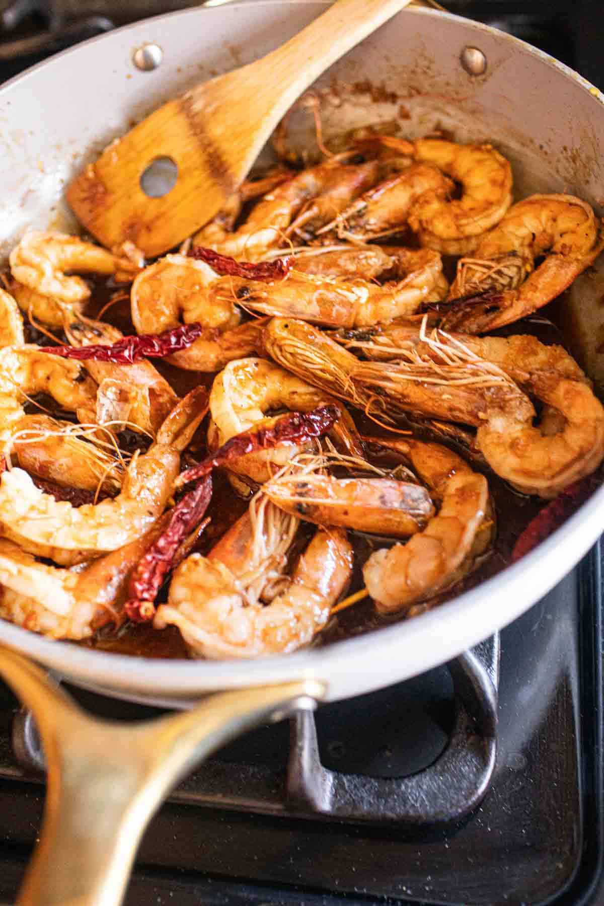 Thai prawns in tamarind sauce in a pan.